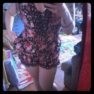 NWOT Floral Romper with POCKETS and ruffled hem